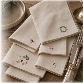 Stofservietter med broderier til den hyggelige juletradition
